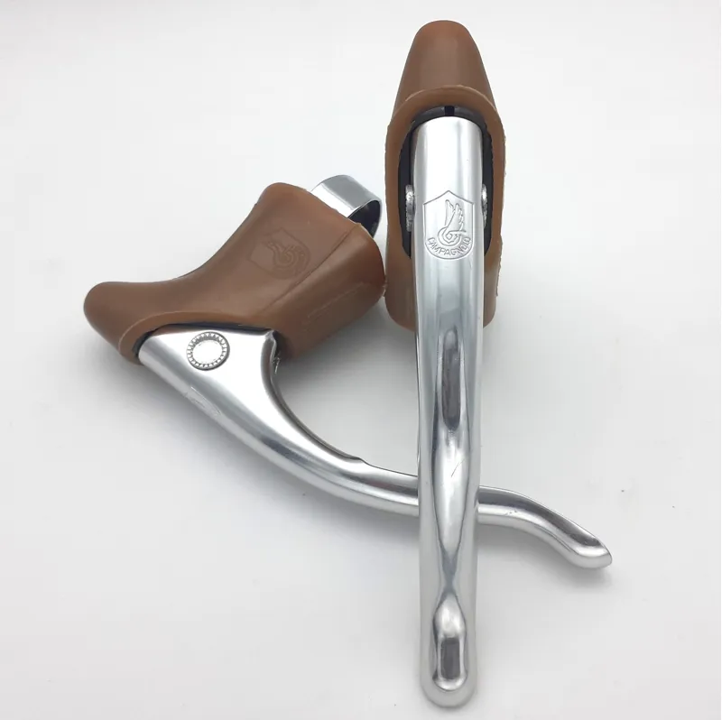 Campagnolo Triomphe Brake Levers In Silver with Gum Brown Hoods NOS Shop Soiled-4