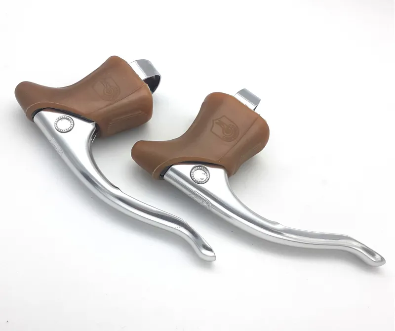 Campagnolo Triomphe Brake Levers In Silver with Gum Brown Hoods NOS Shop Soiled-1