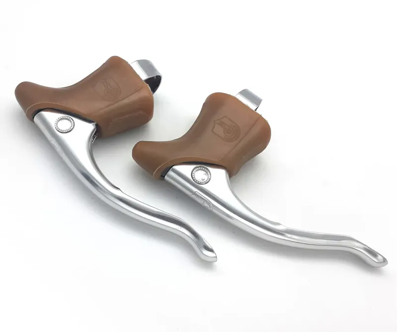Campagnolo Triomphe Brake Levers In Silver with Gum Brown Hoods NOS Shop Soiled